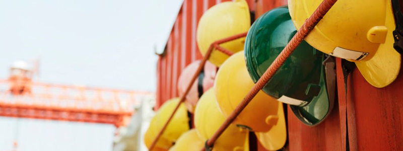 Workplace Safety Ireland image of safety helmets on building site 