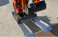 Digger loading on ramps 