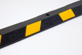 Black and yellow wheel stop 