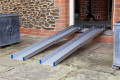 Combi channel ramps resting on threshold 