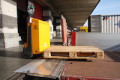 Pallet truck going over hinged tailboard 
