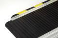 Safety edges on wheelchair ramp black and yellow