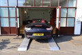 Car going in to showroom
