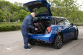 AeroCarbon Scooter being placed in boot of car 