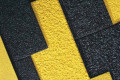 Black or yellow cleats