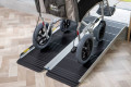 Wheelchair overcoming a step using a wheelchair ramp