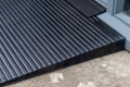 Rubber ramp with door sill guard