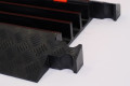 Interlocking cable ramp with anti-slip surface