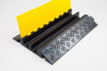 Black and yellow heavy duty cable protector
