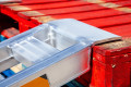 Curved rest on connection of the loading ramps