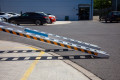 Pair of loading ramps resting on concrete