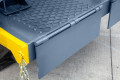 Hinge plate to connect the yard ramp to the container 