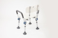 Rear view of the white shower chair with handles and backrest 