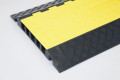 Heavy duty cable protector with anti-slip surface