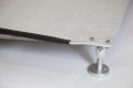 Rubber raised edge on adjustable threshold ramp 