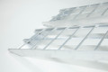 Foot of the folding loading ramps resting on ground, cut for the loading angle