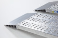 aluminium car ramps resting on ground