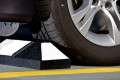 Black and white wheel stop 