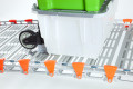 Trolley going up aluminium loading ramp