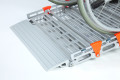 Manual Wheelchair going up a wheelchair ramp 