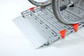 Portable wheelchair ramp in use 