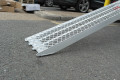 Loading ramp resting on concrete floor 