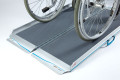 Aerolight Xtra Folding Wheelchair Ramp WITH MANUAL WHEELCHAIR GOING UP RAMP