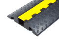 Chequered rubber cable protector with yellow hinge lid
