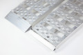 Aluminium loading ramp rest on connection and angled foot