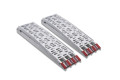 Pair of motorbike loading ramps folded up on white surface