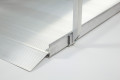 Handrail attached to wheelchair ramp