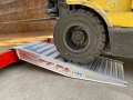 side view of a pair of container ramps