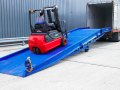Forklift driving on to yard ramp 