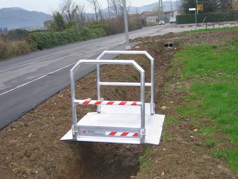 Pedestrian walkway going over a trench 