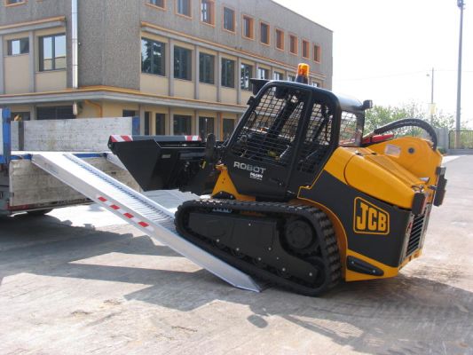 Plant machine driving on to ramps 