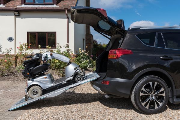 Loading a scooter using premium multifold ramp 