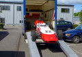Race car unloading from truck
