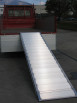 Truck ramp resting on tipper truck 