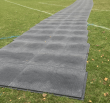 Safe site matting installed on grass 