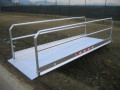 Vehicle gangway in place over trench