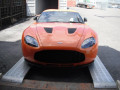 Car driving up car loading ramps