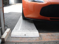 Car loading ramps rest on connection