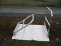 Part folded vehicle gangway handrails