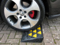 Car on a kerb ramp