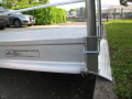 Vehicle ramp resting on kerb 