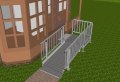 Steel access ramp with handrails