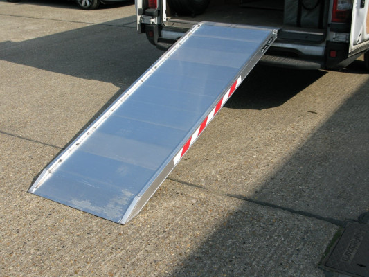 Premium viper ramp resting on van 