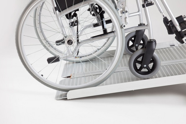 Wheelchair on wheelchair ramp