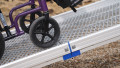 Loading manual wheelchair using a FEAL AnyRamp into a vehicle