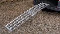 Loading ramp resting onto vehicle